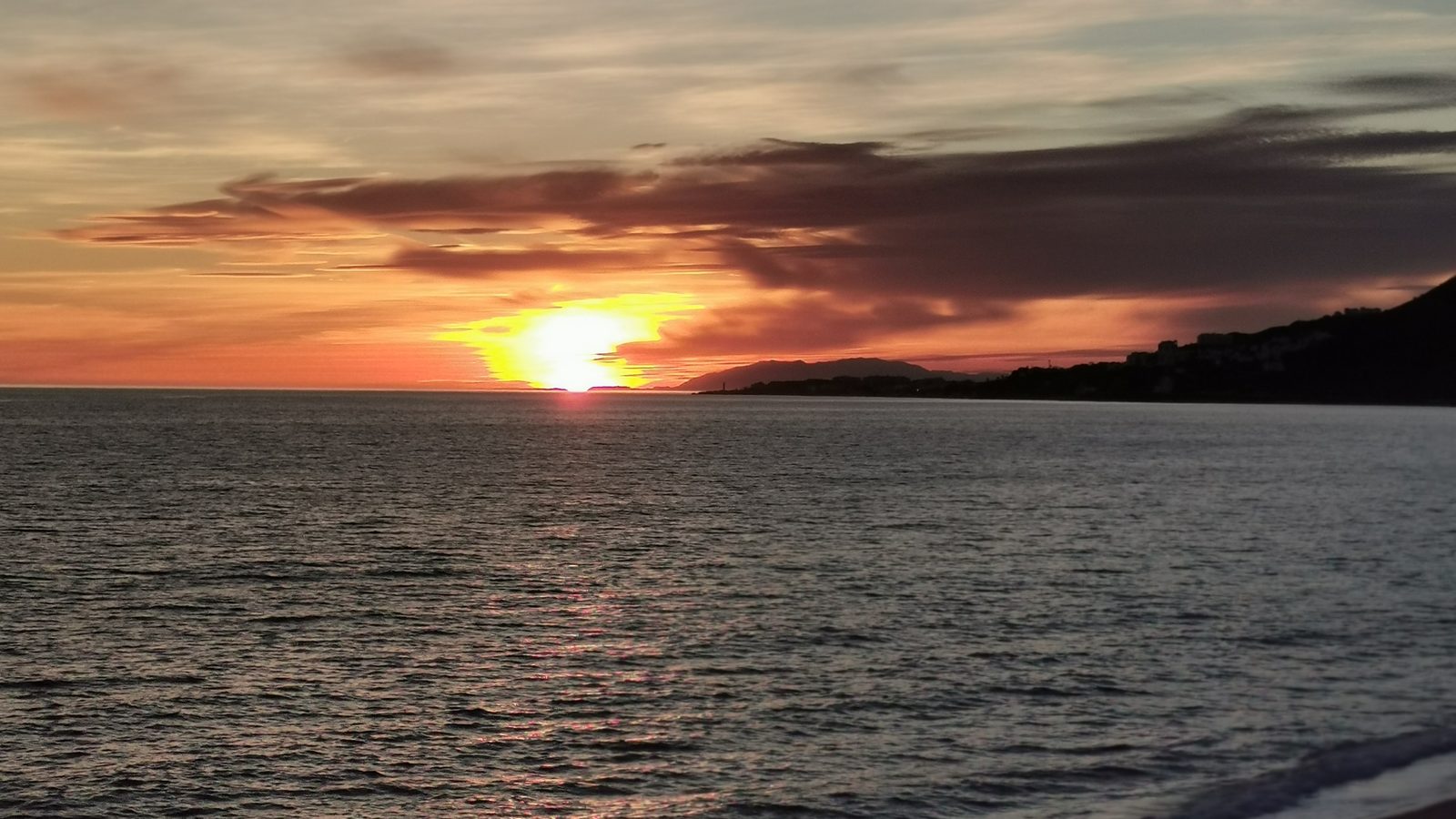 Solnedgang på stranden